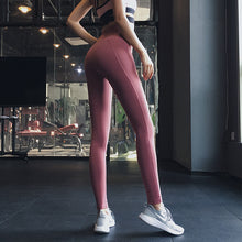 Cargar imagen en el visor de la galería, 2021 new quick-drying hip stitching yoga pants female peach hip running sports tights yoga clothes fitness pants
